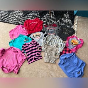 11 tops - size 10/12/Large or fit like a large. Red top is not in bundle.